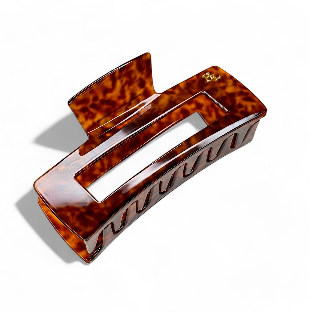 Leo dark tortoise plant-based acetate XL claw clip on a white background