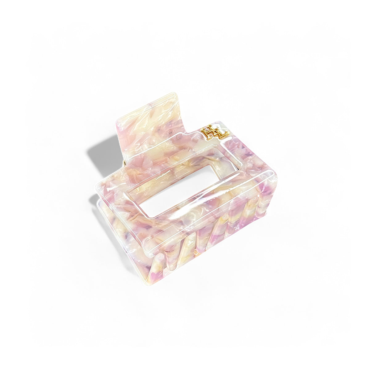 Sweetheart pink and cream plant-based acetate midi claw clip on a white background