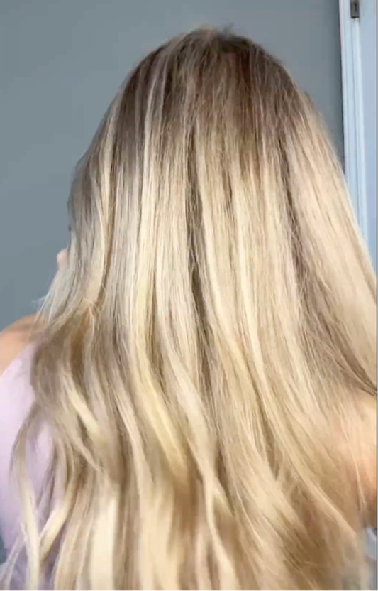 Long blonde hair viewed from behind