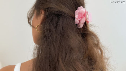 An image of two pins in beige and turquoise colors